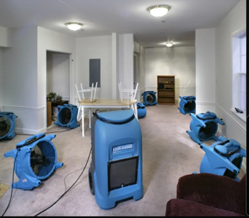 Air movers and dehumidifier setup for Water Damage Restoration in Little River